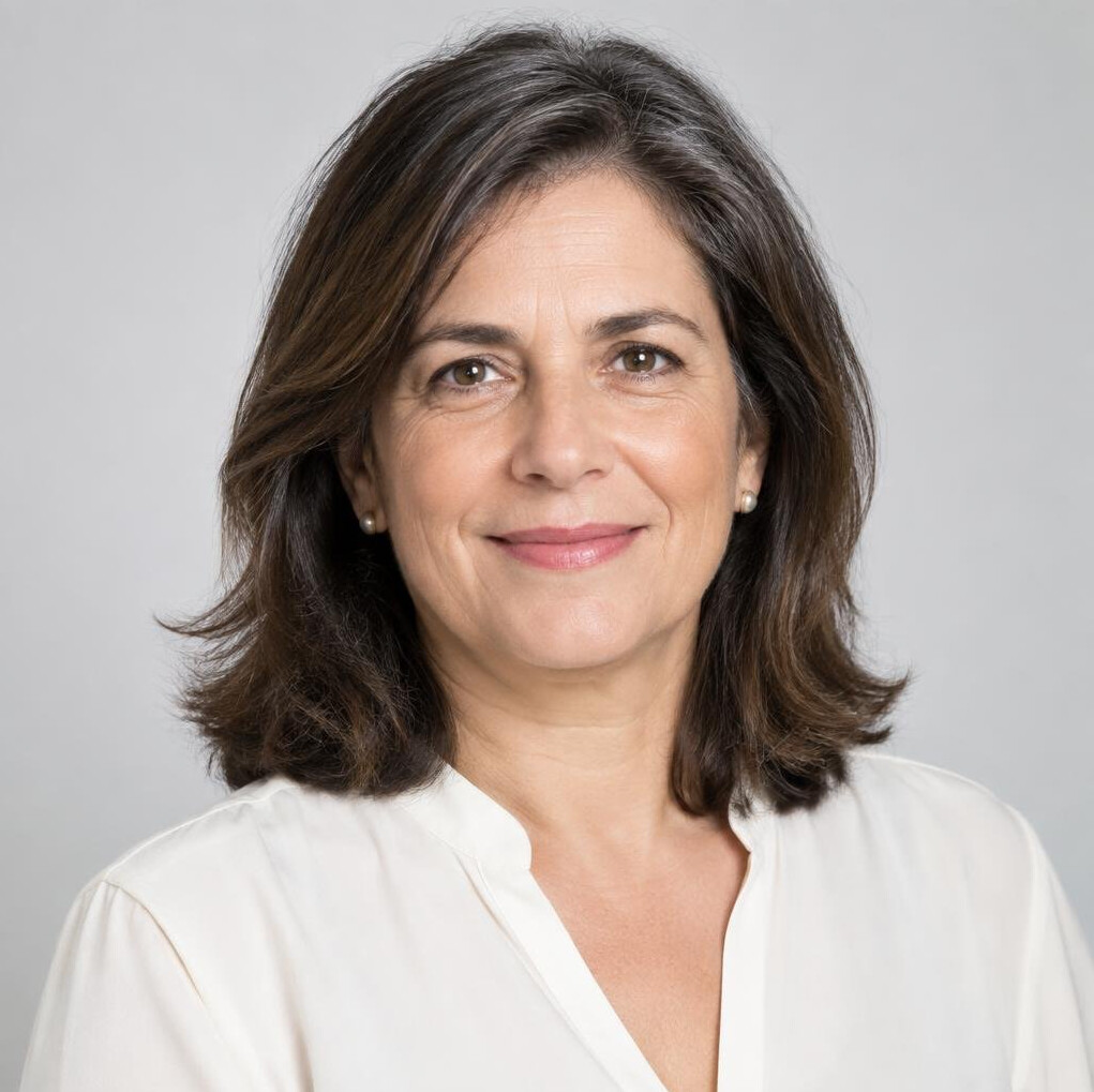 Studio portrait of a Portuguese woman senior fact-checker in her 50s