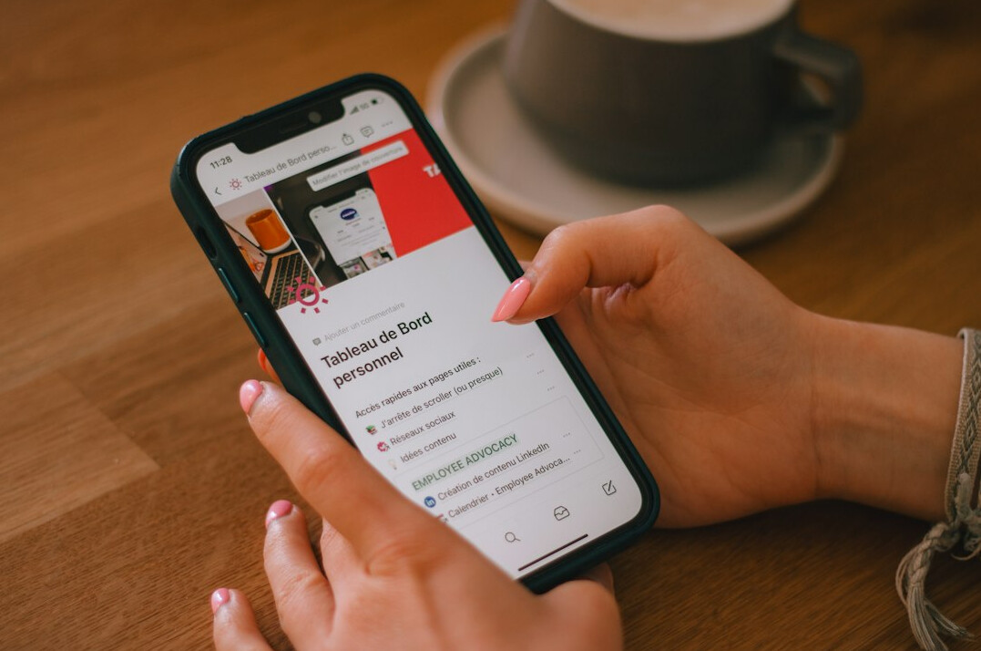 person checking news on phone